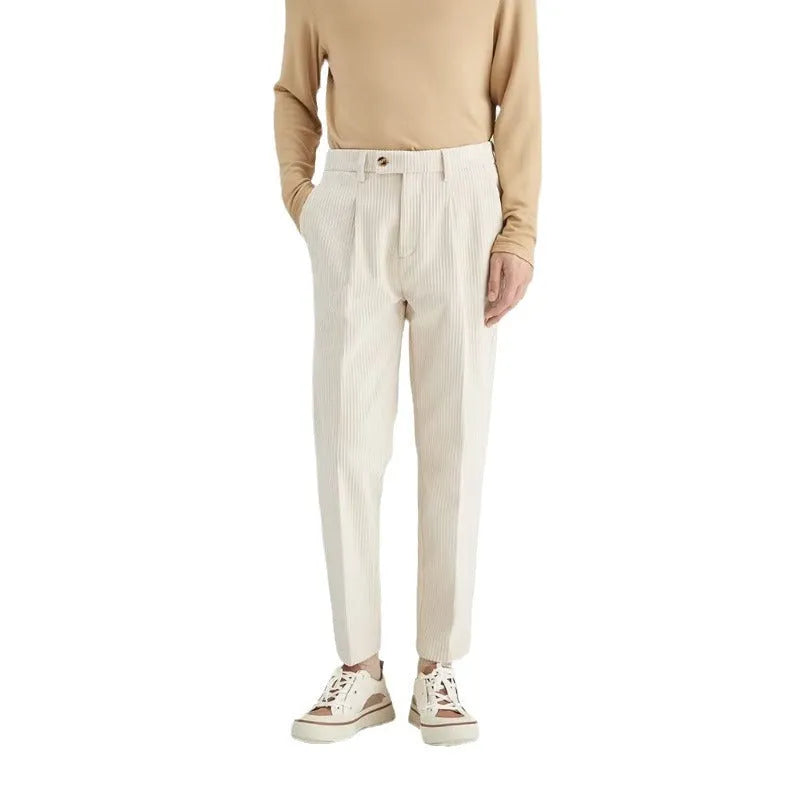 Men's straight-leg corduroy trousers in beige, black, and brown grey, showing mid-waist and micro elastic fabric detail.
