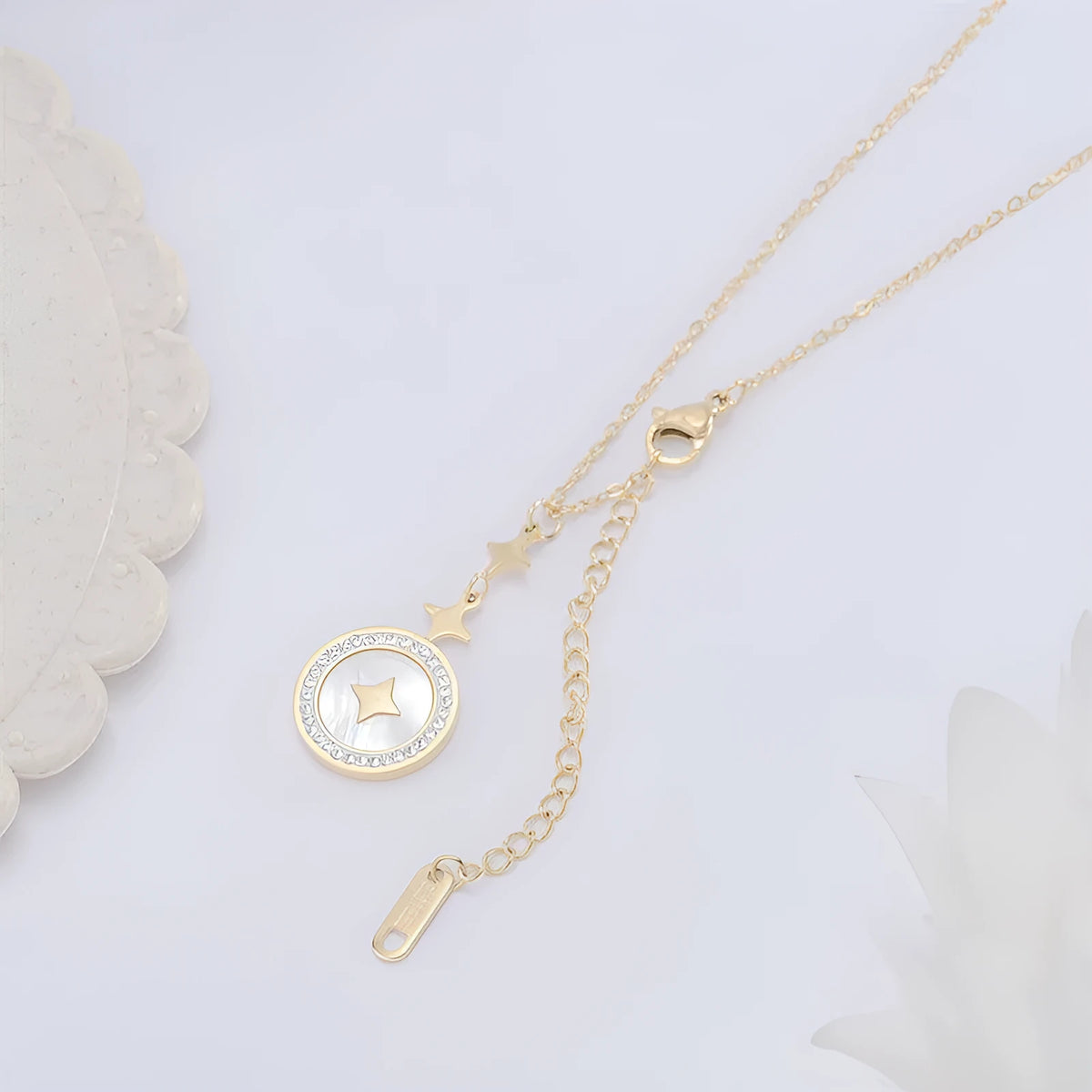 Gold titanium steel necklace with six-pointed star pendant and diamond accents on 42cm chain