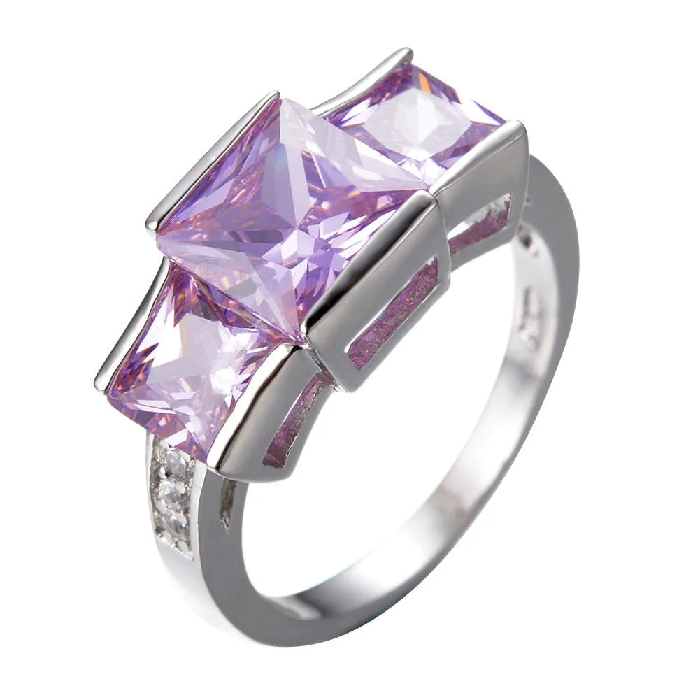 A set of colourful electroplated copper rings for women in sizes 6 to 10, showing apple green, champagne, and sapphire blue colours.
