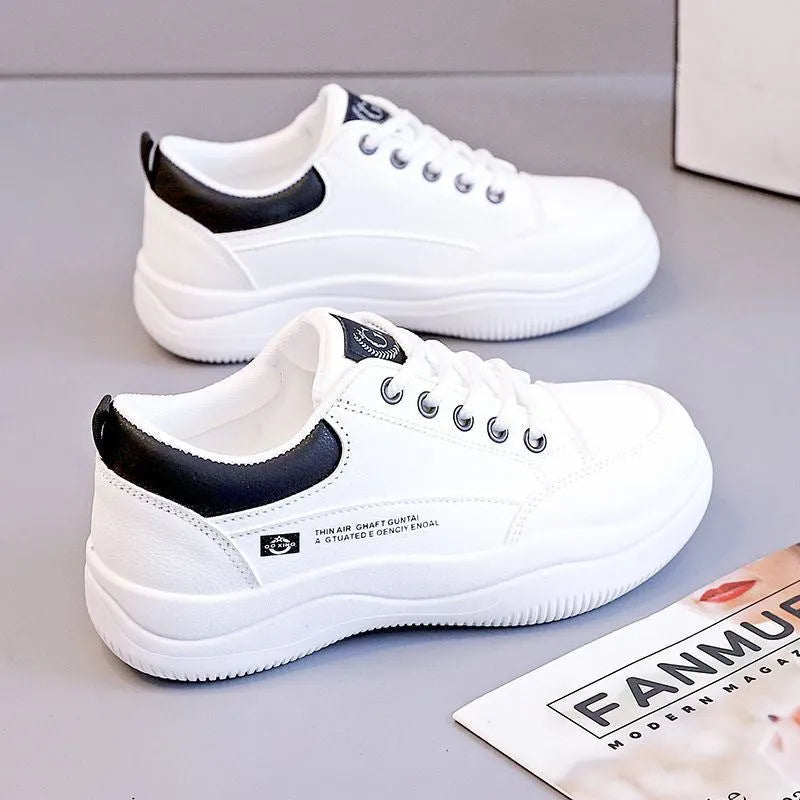 Women's white Korean-style lace-up pumps with cross straps and a round toe.