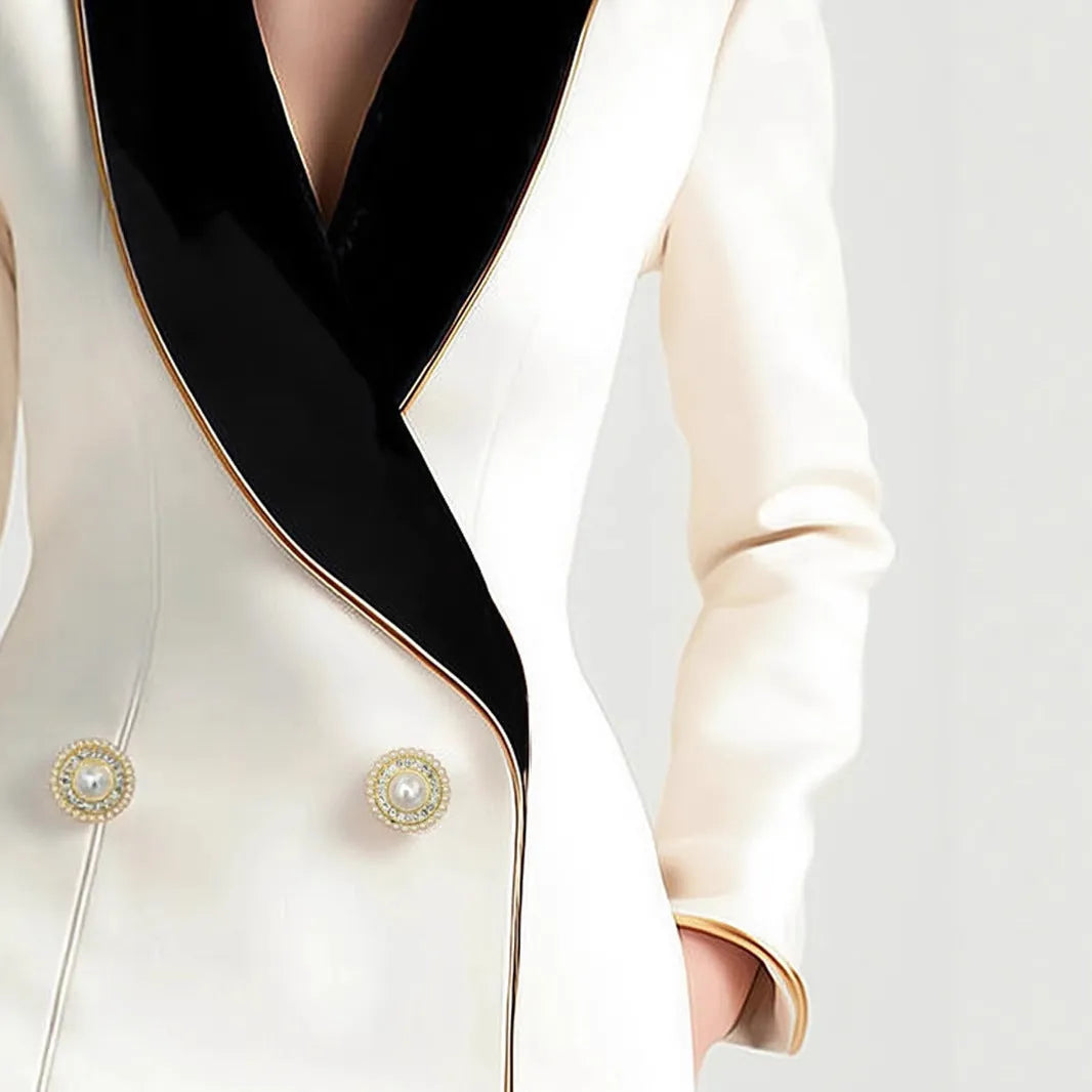 Milky white women's long sleeve coat with golden edge detailing and pearl buttons, irregular cut design