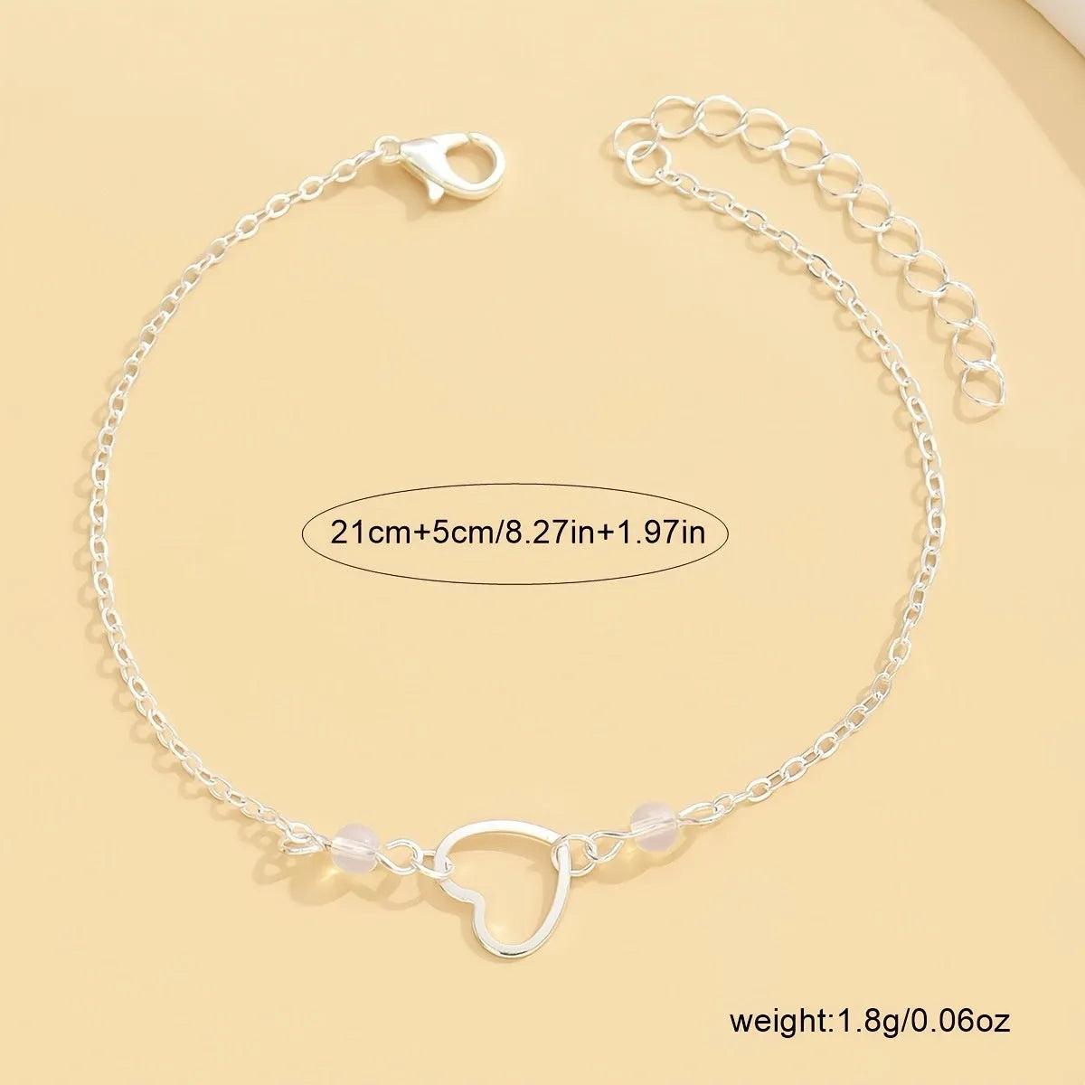 Women's adjustable anklet with heart pendant in gold or silver alloy