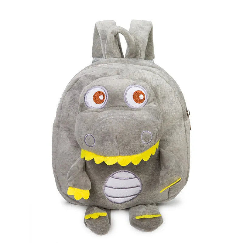 Blue dinosaur plush backpack for children with embroidery, soft handle, and polyester lining.