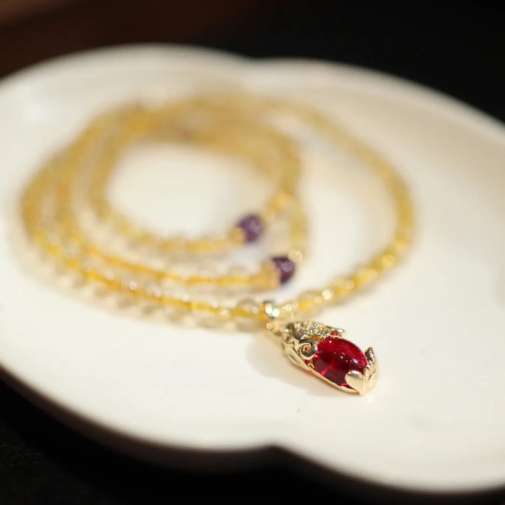 Brazilian gold rutilated quartz bracelet with three gold-plated rings, Chinese style design