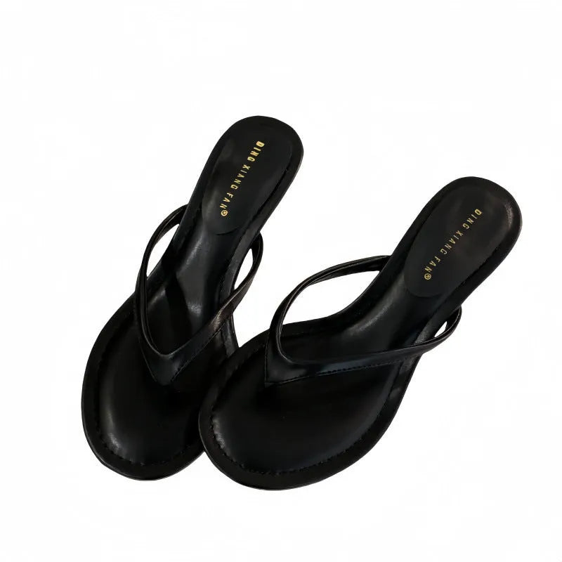Women's round toe stiletto flip-flop sandals in black and camel colours showing open-toed design