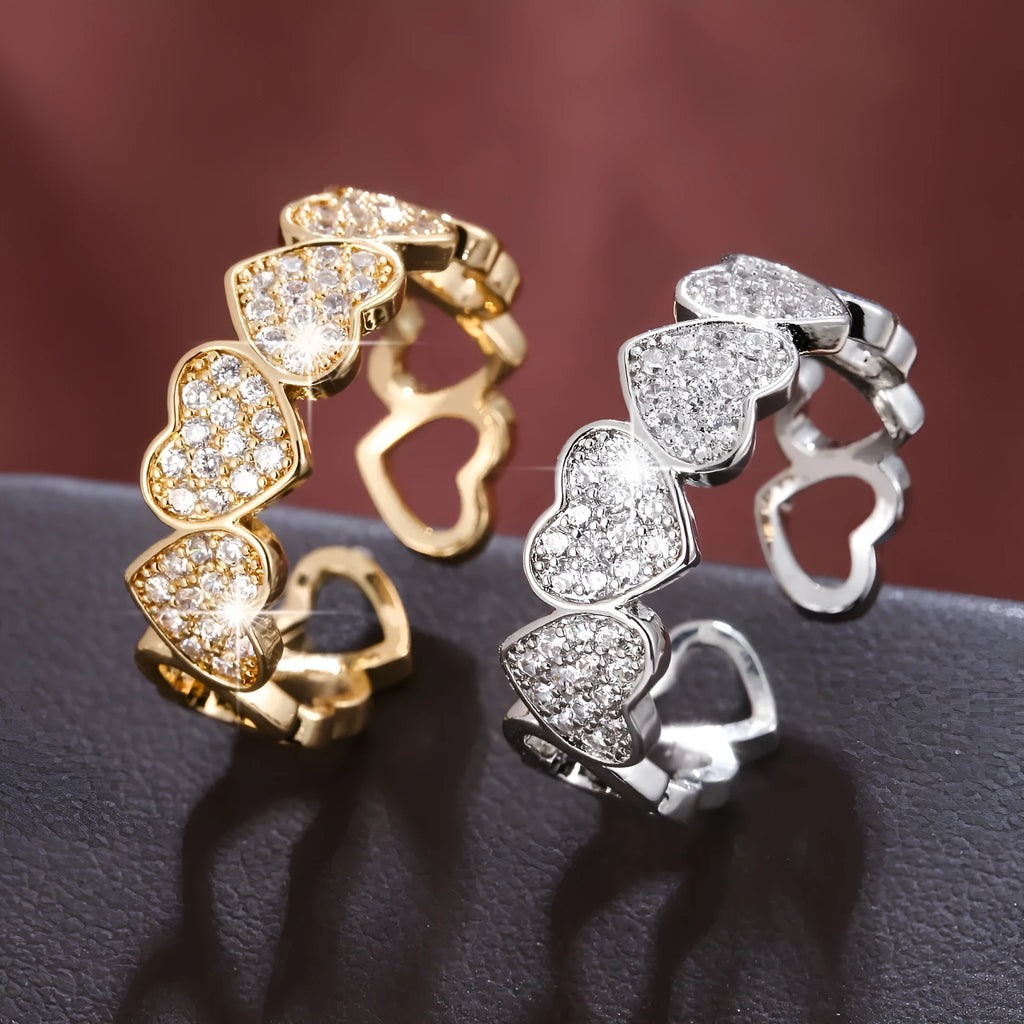 Adjustable opening couples ring with love heart design in gold or silver colour on geometric copper band