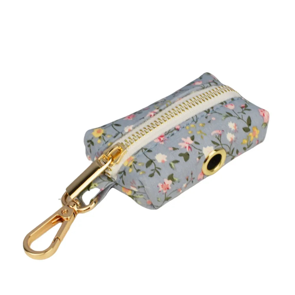 Blue floral polyester cotton dog collar with matching leash, bow tie, vest and poop bag holder set