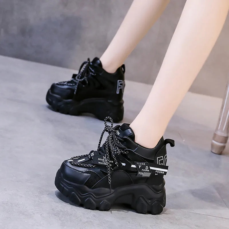 Women's white breathable mesh platform sports shoes with a cross strap and rubber sole.