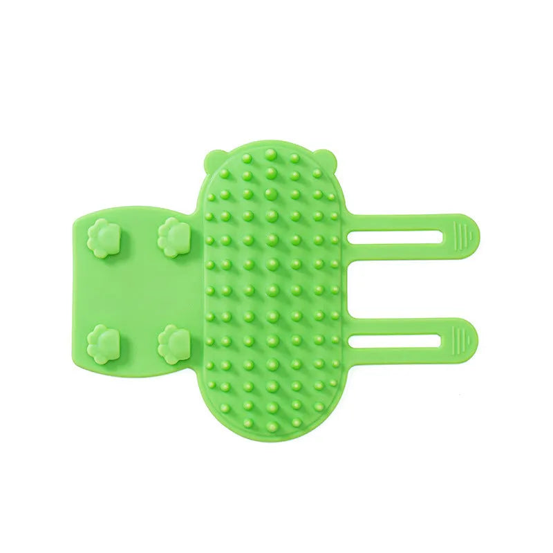 Silicone pet grooming comb with adjustable strap mounted on table leg for cats and dogs