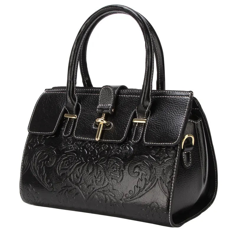 Vintage oval crossbody women's bag in genuine leather with embossed design and internal compartments