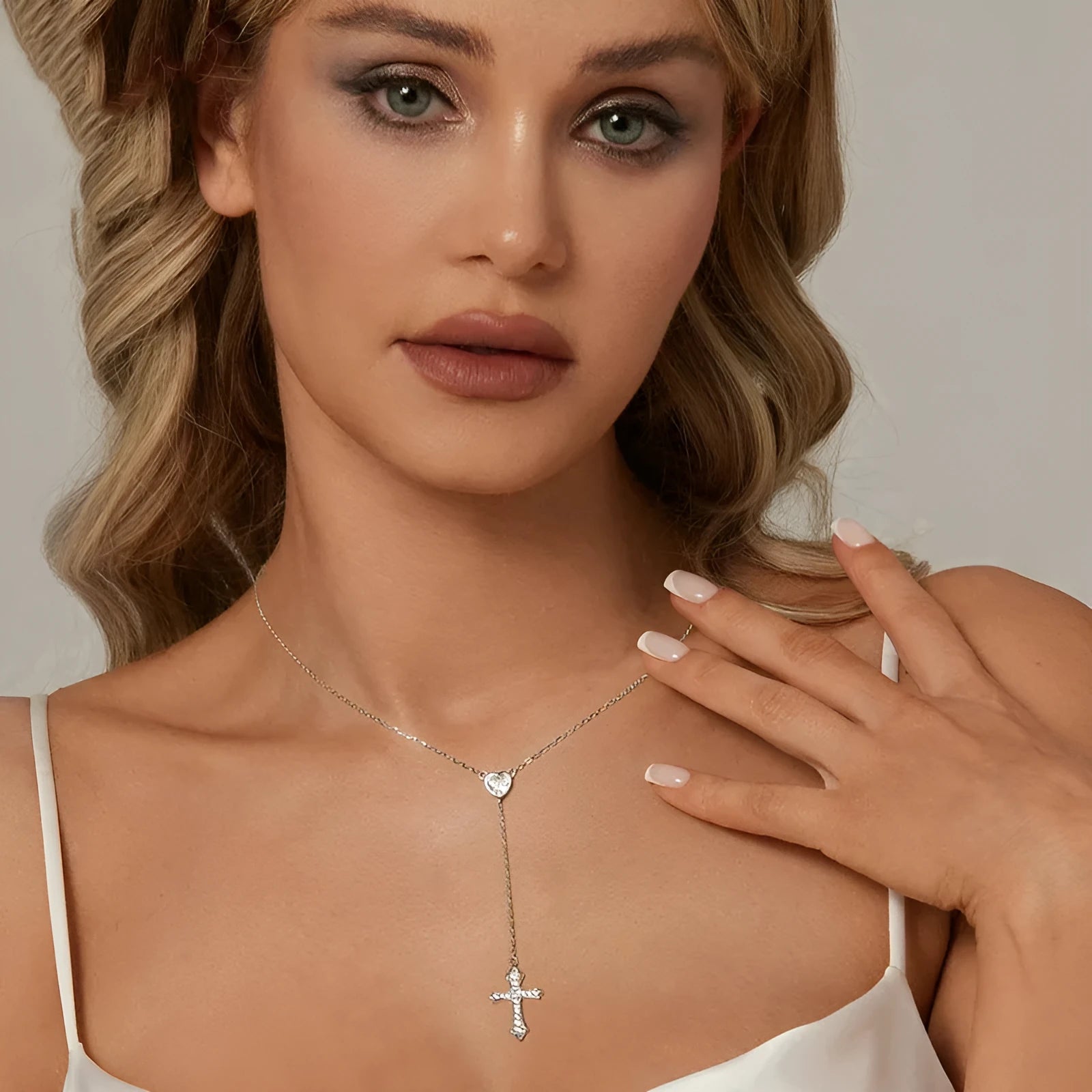 Silver necklace with V-neck cross pendant on O-ring chain in colour BSN384