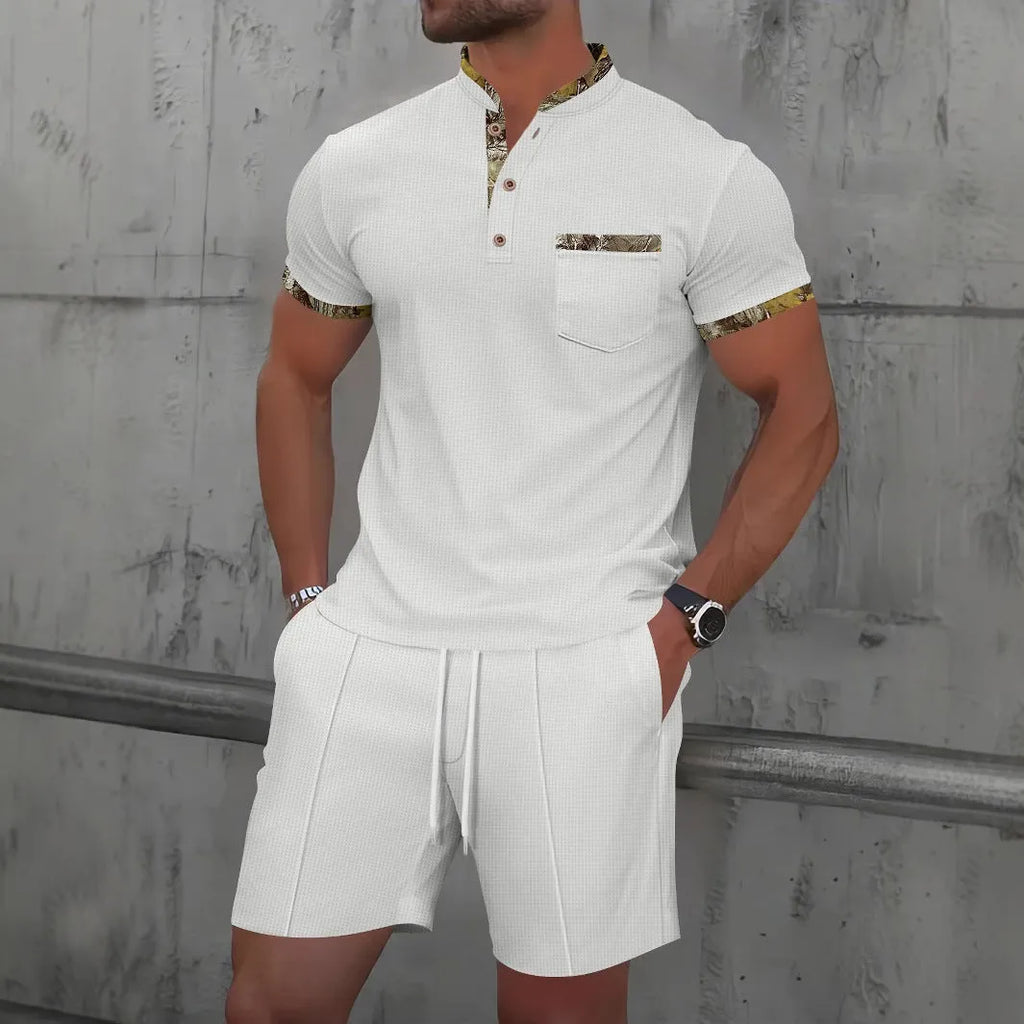 Men's grey cotton blend polo short sleeve suit with matching shorts laid flat