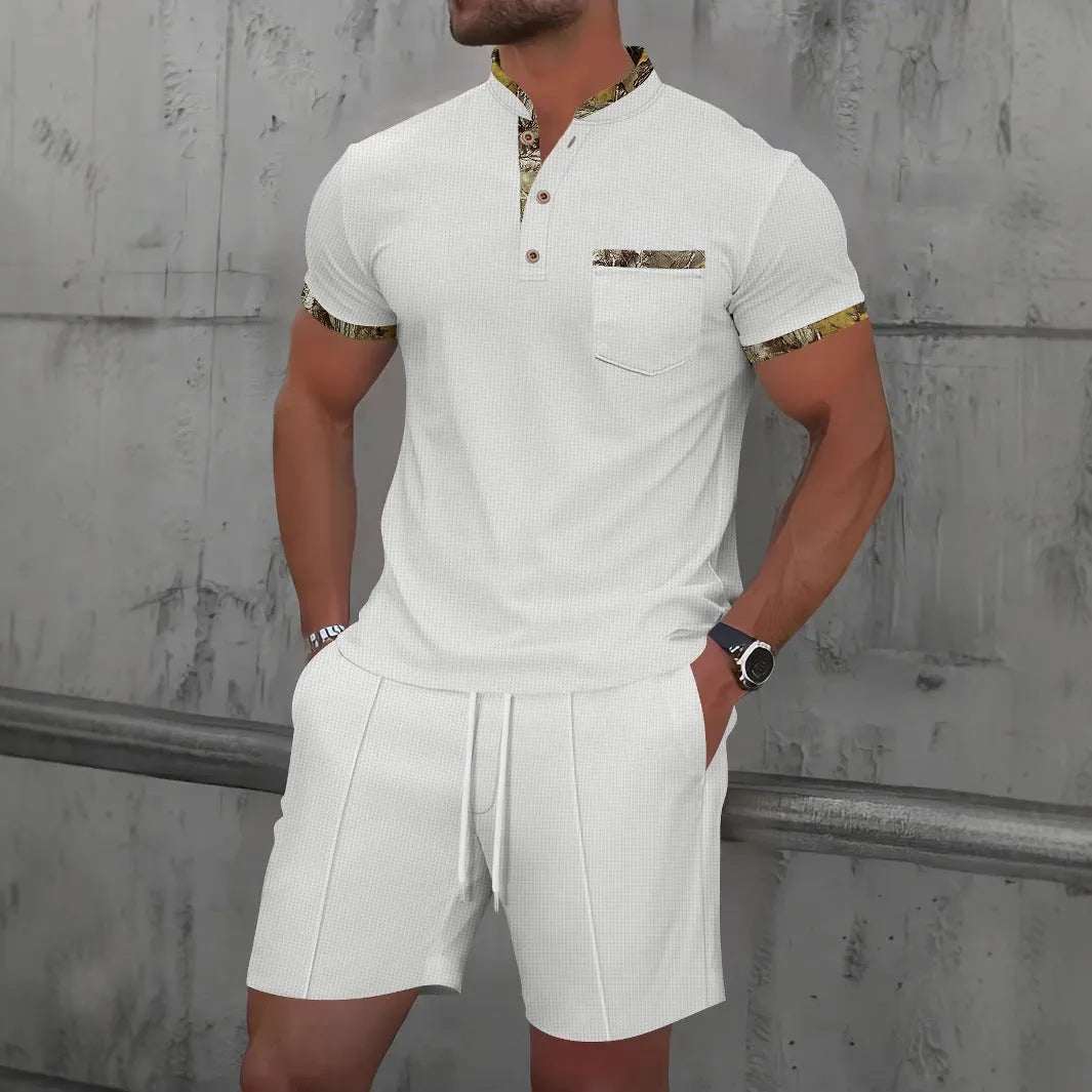 Men's grey cotton blend polo short sleeve suit with matching shorts laid flat