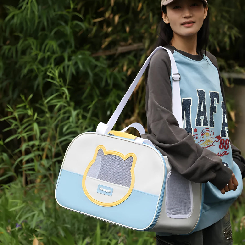 Blue foldable cat backpack made from Oxford cloth, shown with ventilation and shoulder straps.