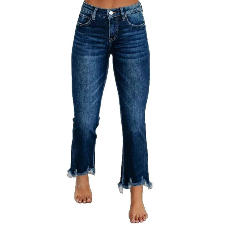 Women's solid colour denim jeans with hand-worn distressing in light blue wash, straight leg fit