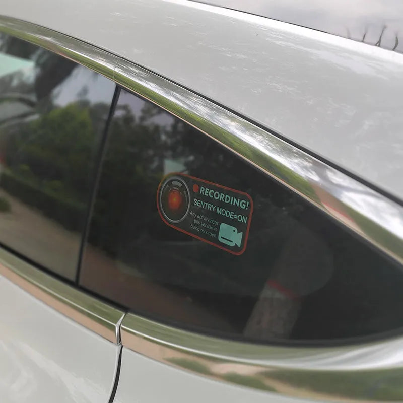 Tesla Sentry Mode electrostatic warning stickers measuring 11x5cm
