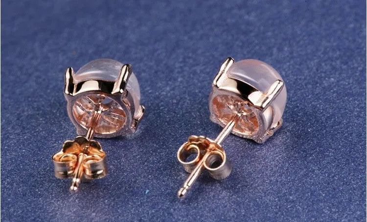 Korean style women's rose gold drop shape stud earrings with synthetic quartz and crystal inlay