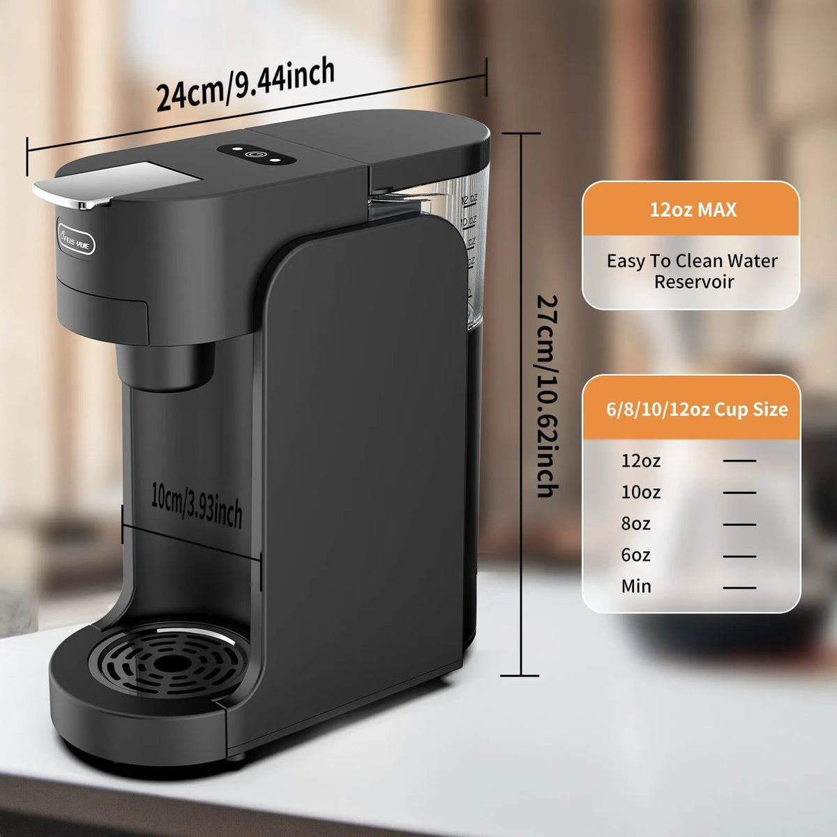 Black and white compact capsule coffee machine on a counter with adjustable drip tray and transparent water tank