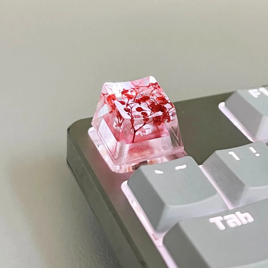 Transparent resin mechanical keyboard keycap with starry sky design in green colour