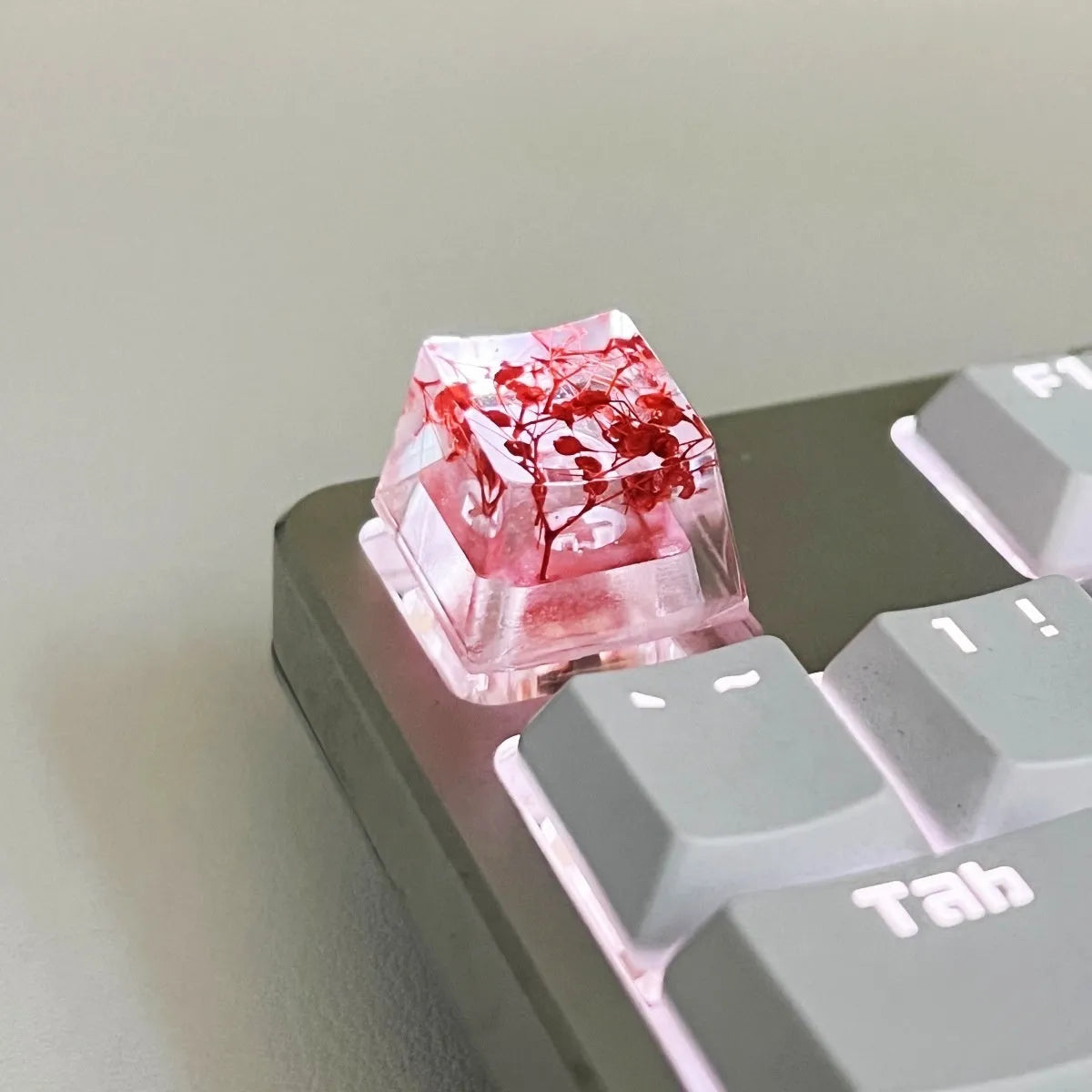 Transparent resin mechanical keyboard keycap with starry sky design in green colour