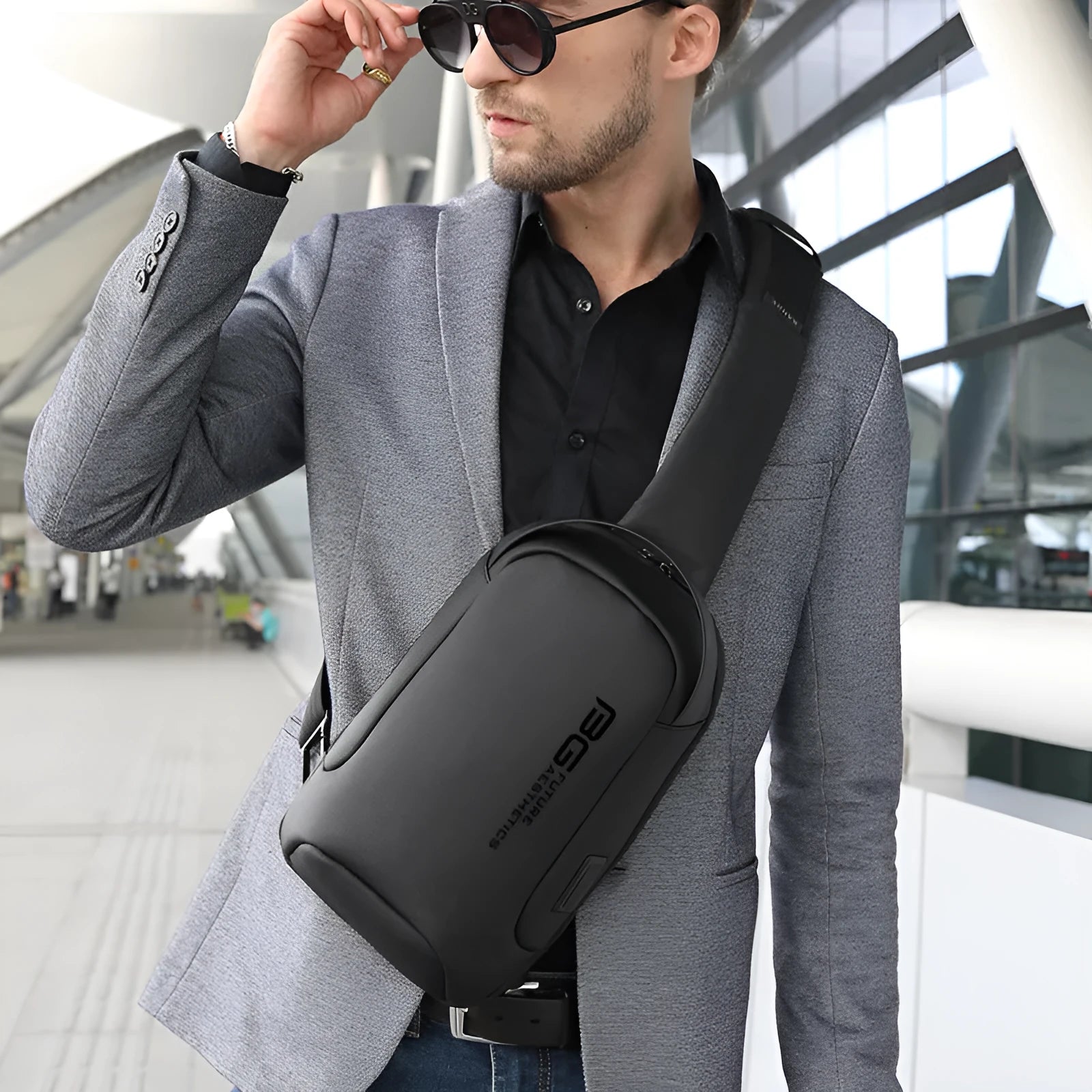 Men's Oxford cloth USB shoulder bag for business travel in blue colour with letter detail