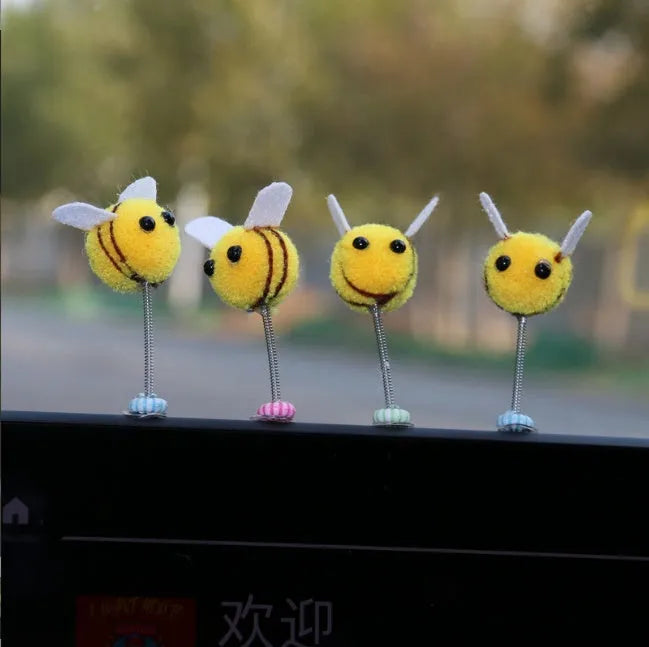 Swing Spring Bee car decoration showing a small, soft fur ball bee on a 3cm by 3cm scale.