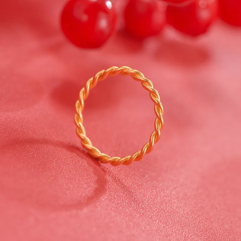 Brass gold plated women's ring showing twist, matte, and glossy style options