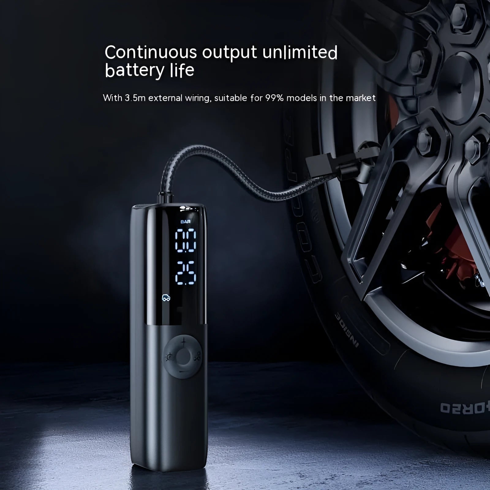 Black portable car air pump with tyre pressure gauge and inflation tube