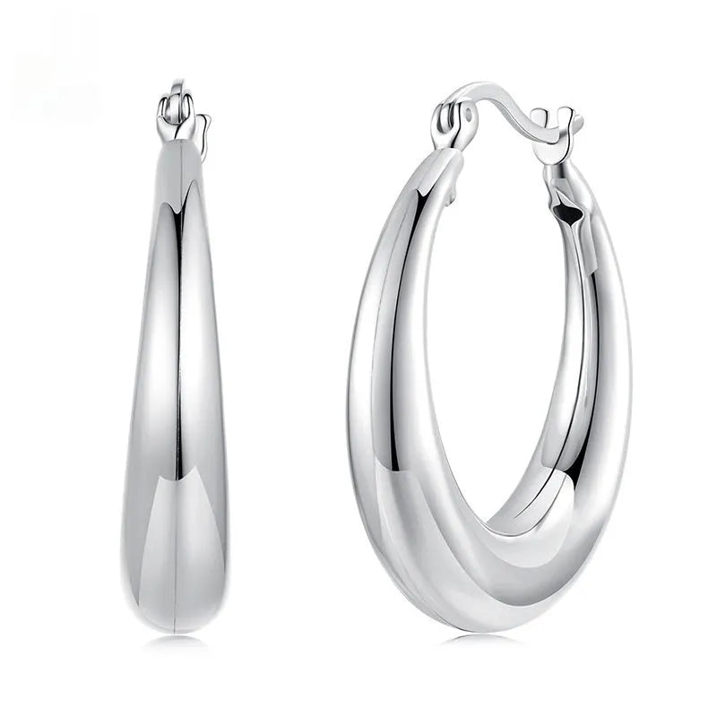 Geometric ring clip earrings with silver needle detail in electroplated copper