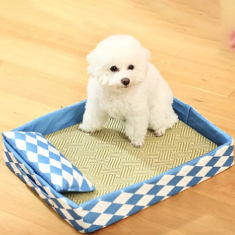 Blue woven rattan cat cooling mat with anti-slip backing placed on a wooden floor.