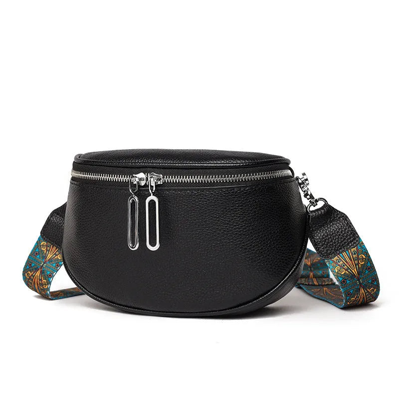 A soft black PU leather women's messenger bag with a single strap, shown in a casual saddle shape.