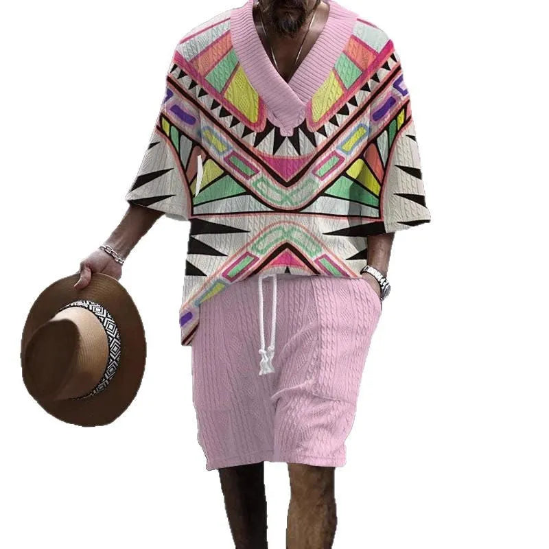 Man wearing a loose light blue short sleeve casual suit top with matching shorts.