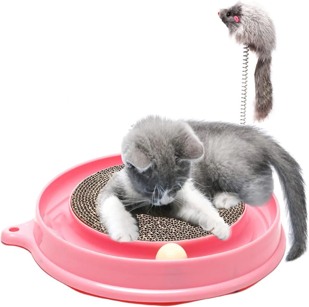 Round corrugated cardboard cat scratcher toy with blue or pink track, rolling ball, and mouse swatter attachment on white background