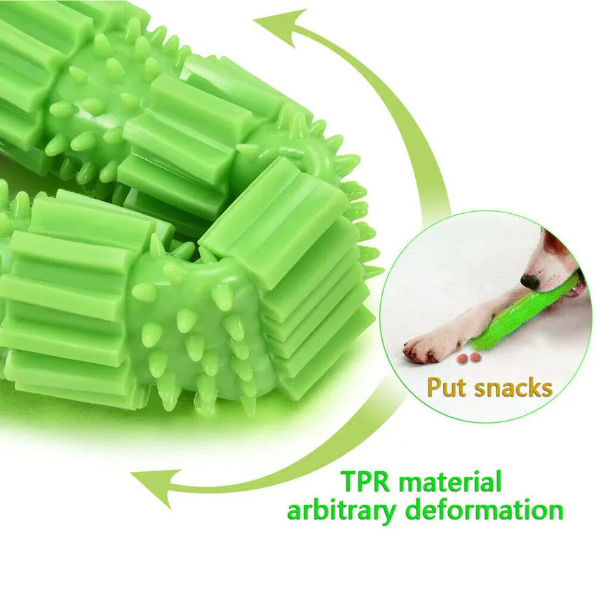 Green and orange durable rubber dog chew toy with textured surface and treat dispensing hole.