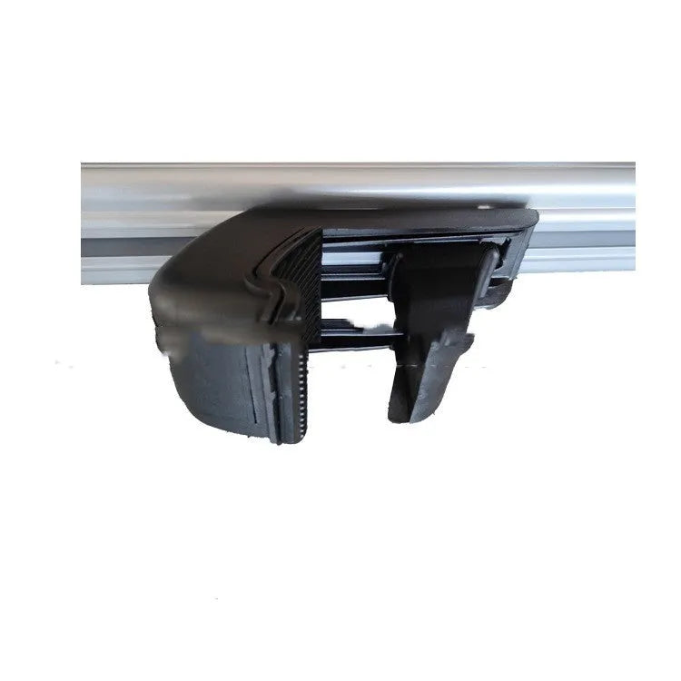 Alloy roof rack crossbar kit for General Motors SUV on vehicle roof, showing adjustable width.