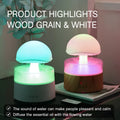 White cloud-shaped humidifier with raindrop simulation and seven-colour lighting, 500ml capacity