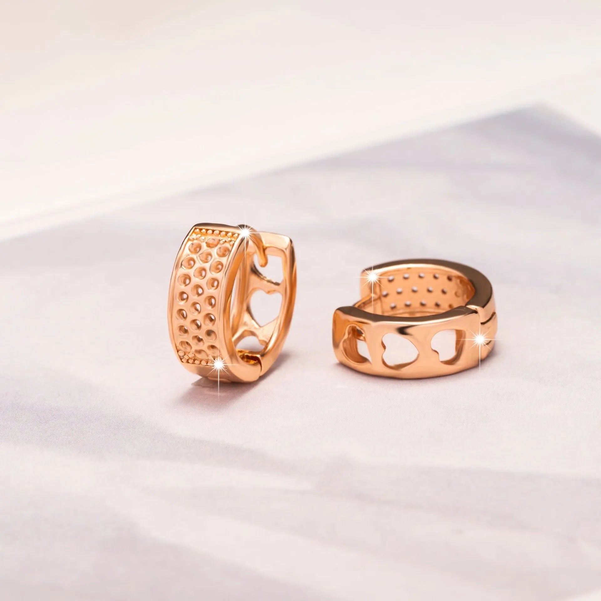Rose gold hollowed heart earrings with circular outline for women