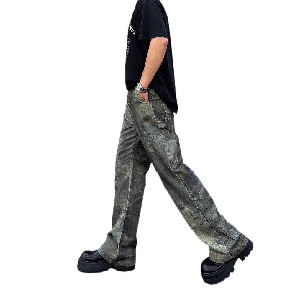 Men's straight-leg jeans with a digital camouflage print on blue denim fabric.