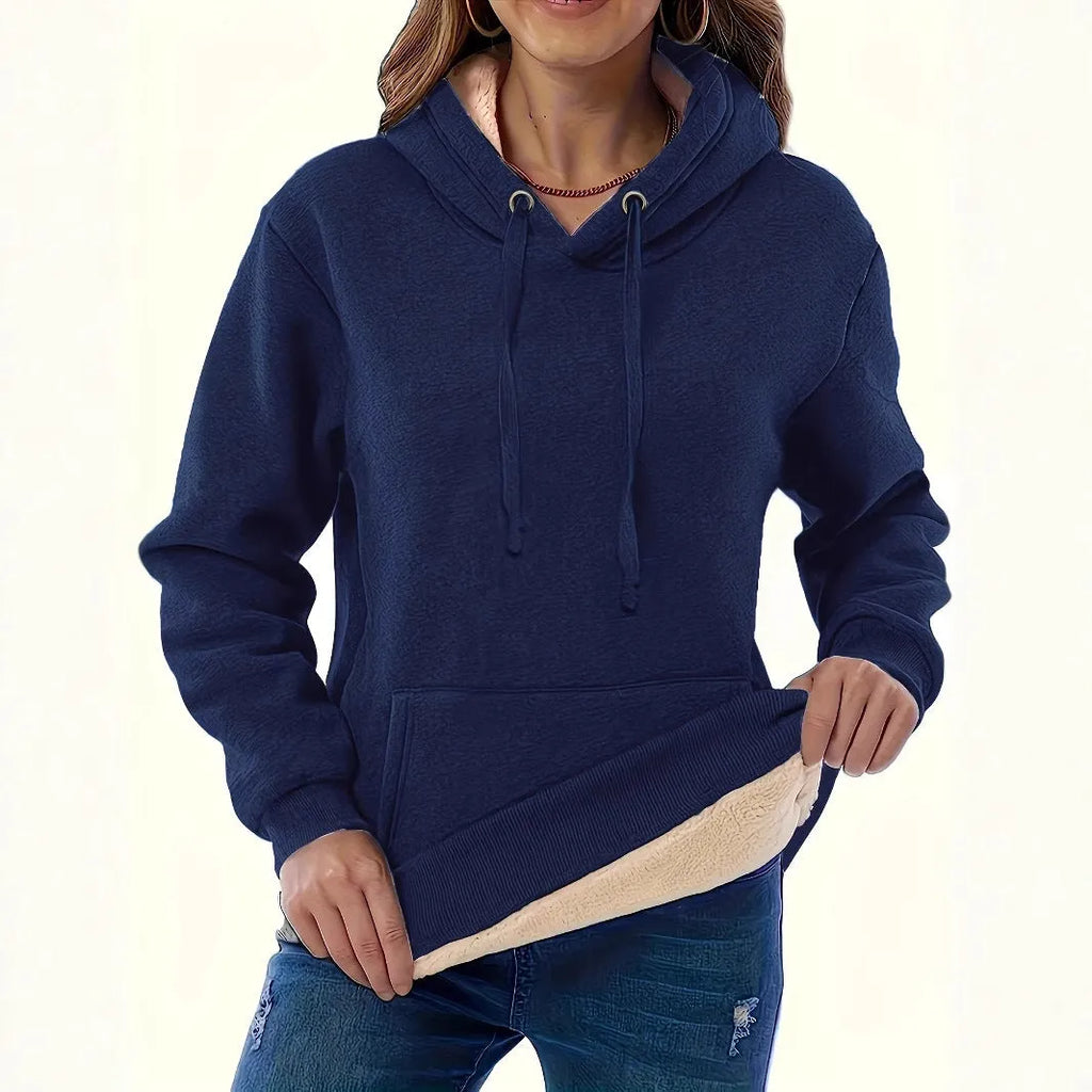 Women's thick polyester hooded sweater with pockets in loose fit