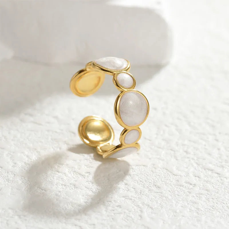 Geometric stainless steel adjustable ring with electroplated metallic finish