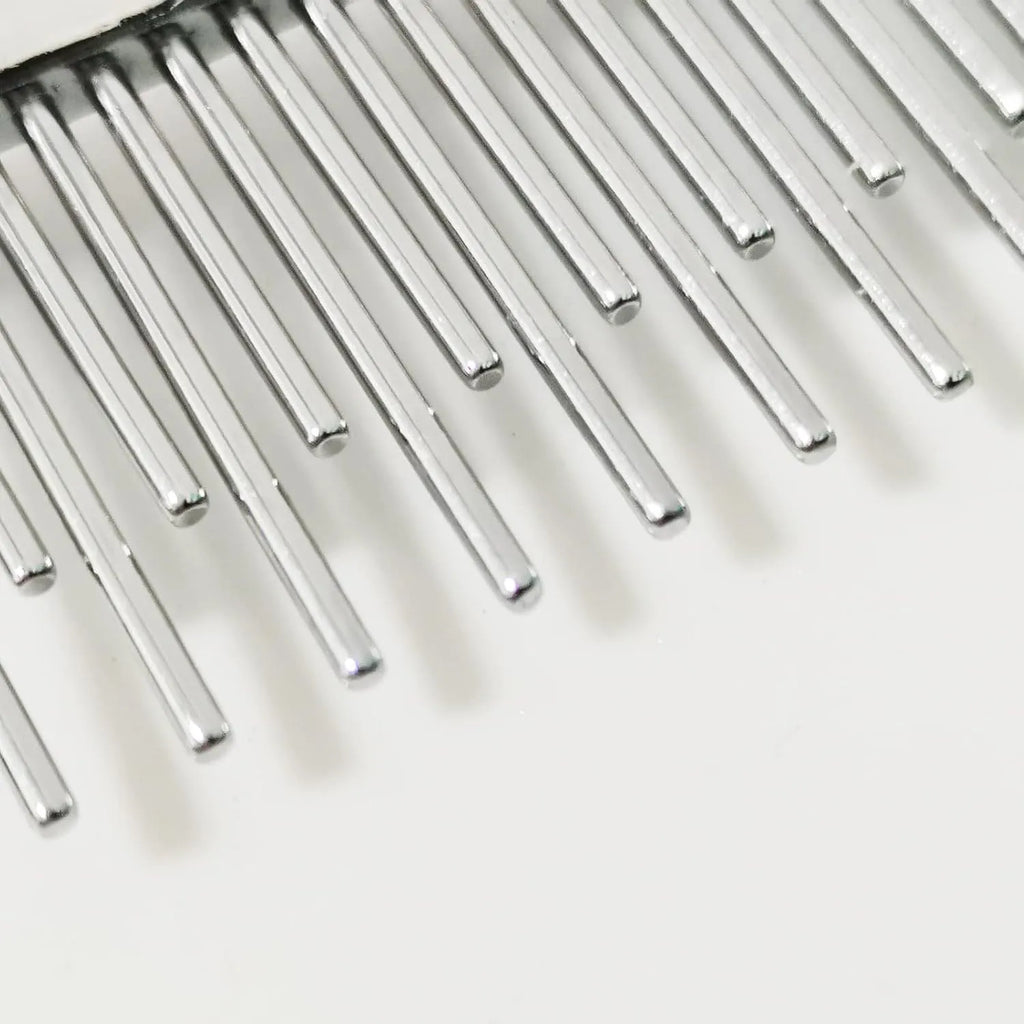 Red plastic handled pet comb with stainless steel long and short teeth for dematting.