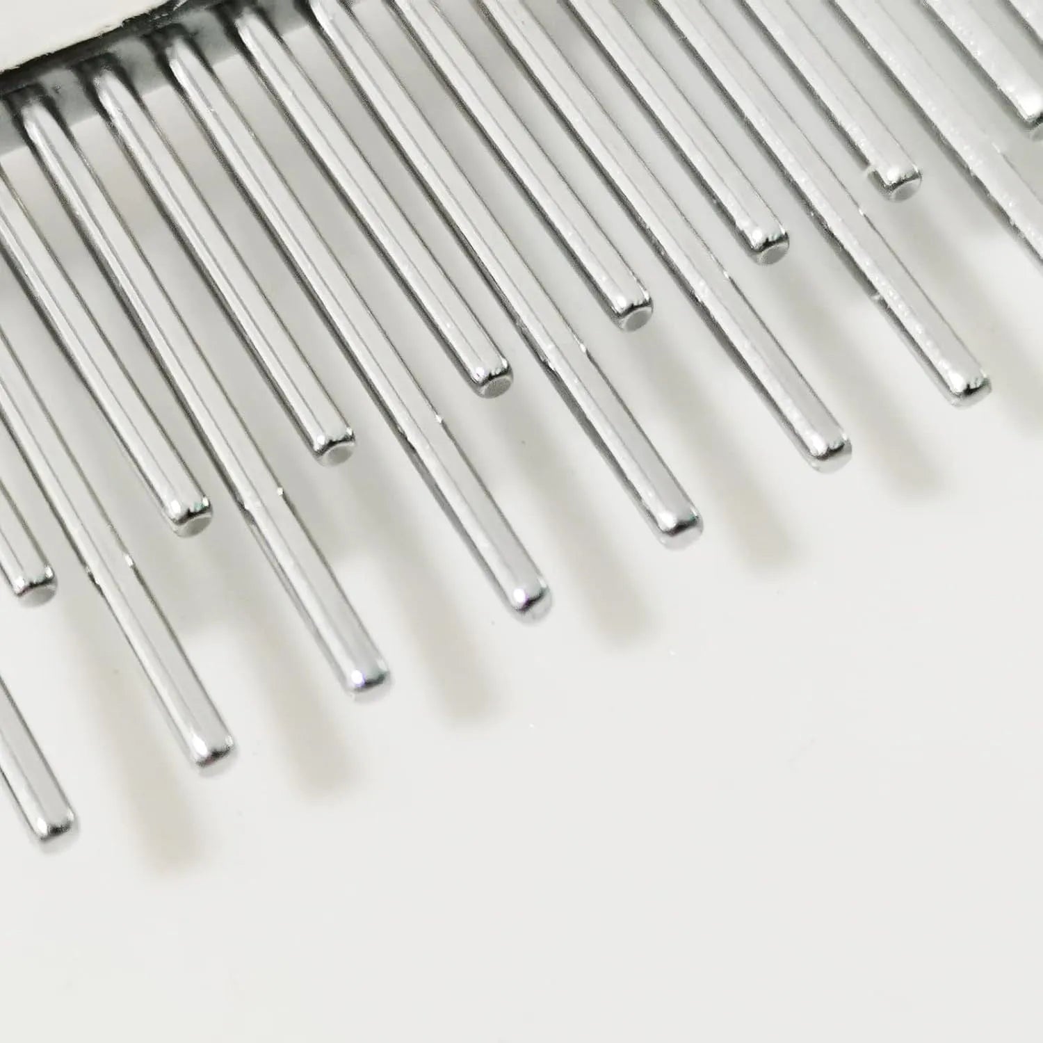 Red plastic handled pet comb with stainless steel long and short teeth for dematting.
