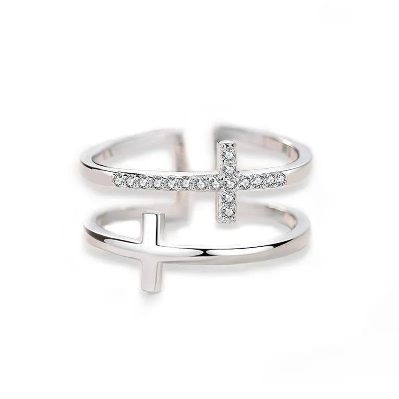 Adjustable copper ring with zircon stones in geometric design, showing open ring construction
