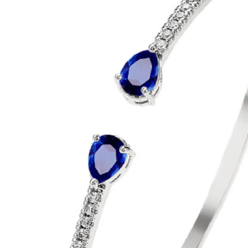 Personalised copper bracelet with multi-zircon inlay in white or blue colour option.