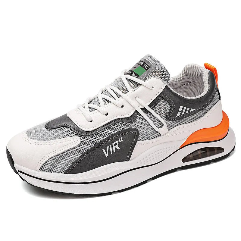 Men's grey mesh running shoes with mid-top height and rounded toe design on white background