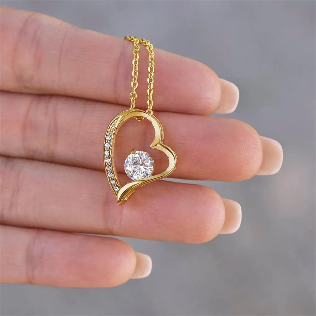 Heart-shaped hollow pendant necklace in silver or gold finish with European styling
