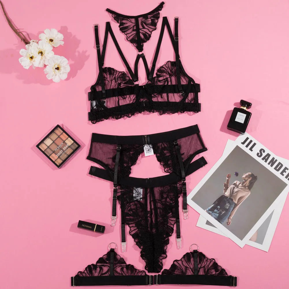 Black women's bikini set with mesh fabric and embroidery stitching, showing front and back.