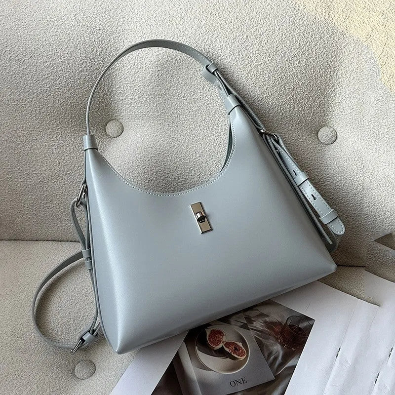 Genuine leather crossbody shoulder bag with dumpling shape and sandwich pocket design