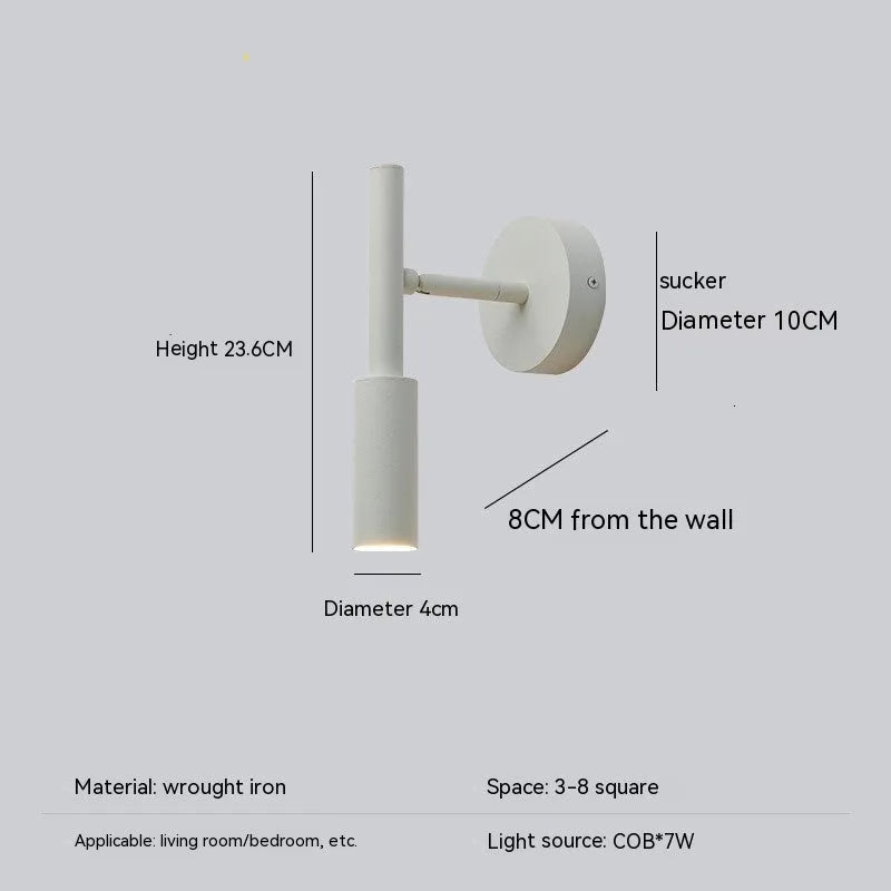 Modern cylindrical wrought iron wall lamp in black or white with three colour light settings.