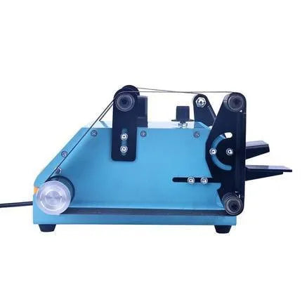 Blue desktop dual-axis belt sander with abrasive belt, variable speed switch, and compact metal frame.